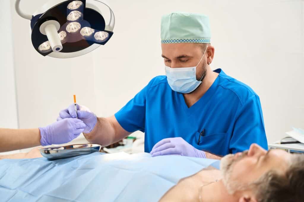 Gynecomastia Surgeon Performing Surgery
