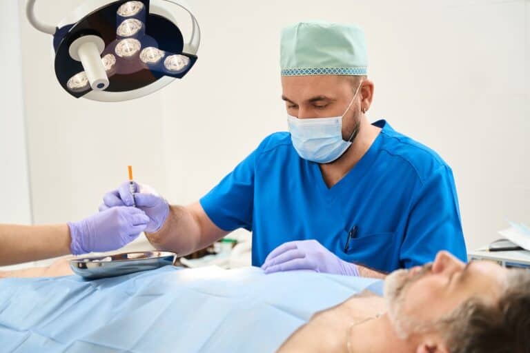 Gynecomastia Surgeon Performing Surgery