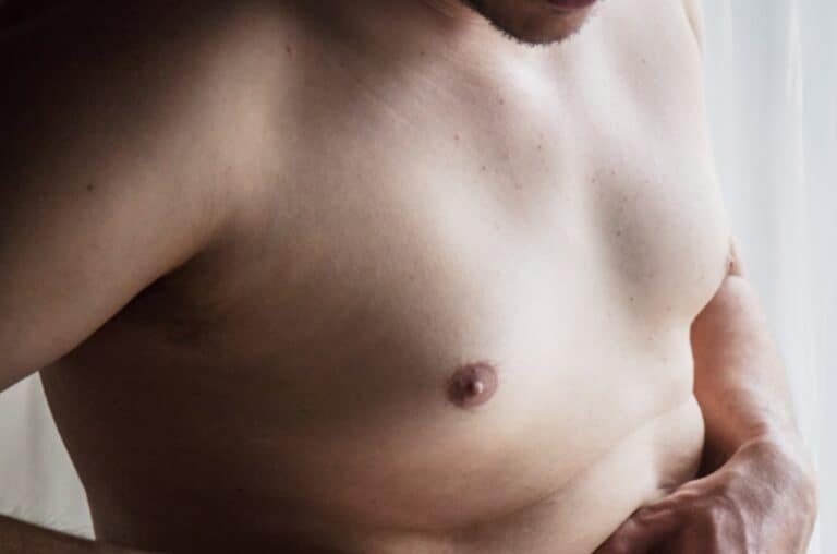 close up of man's fat chest