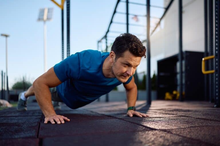 athletic man push ups